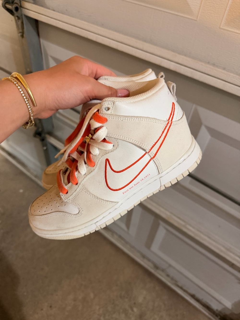 Nike Cream High-Top Sneakers with Orange Swoosh Detail